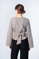 Rückansicht der Bluse Paloma mit Knotendetail
